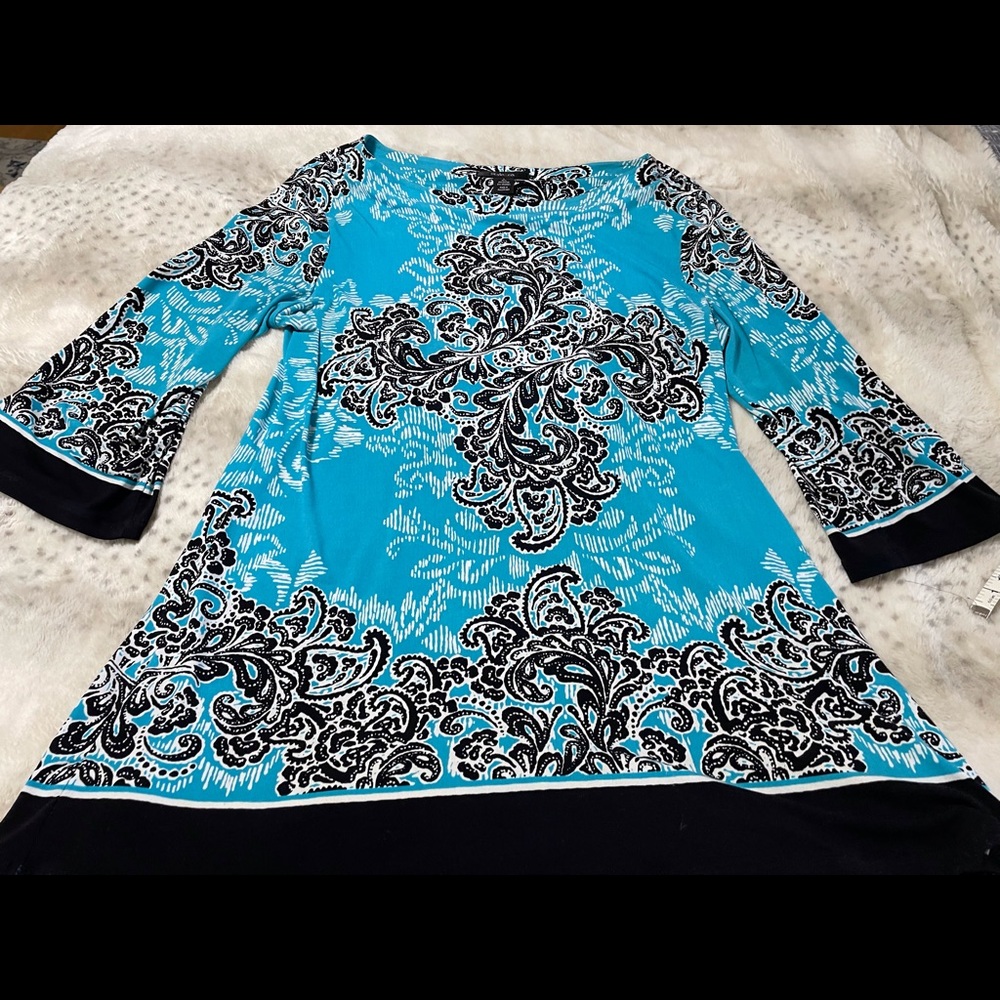 Soft, Jersey knit tunic in perfect condition.